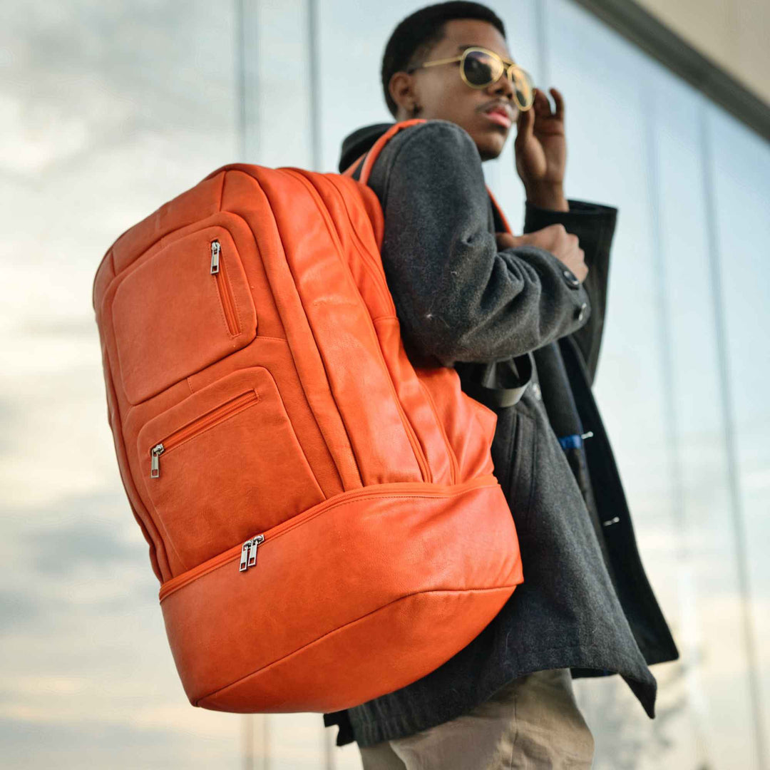 Sole Premise Orange Leather Luxury Carry-On Backpack (Patented Signature Design)