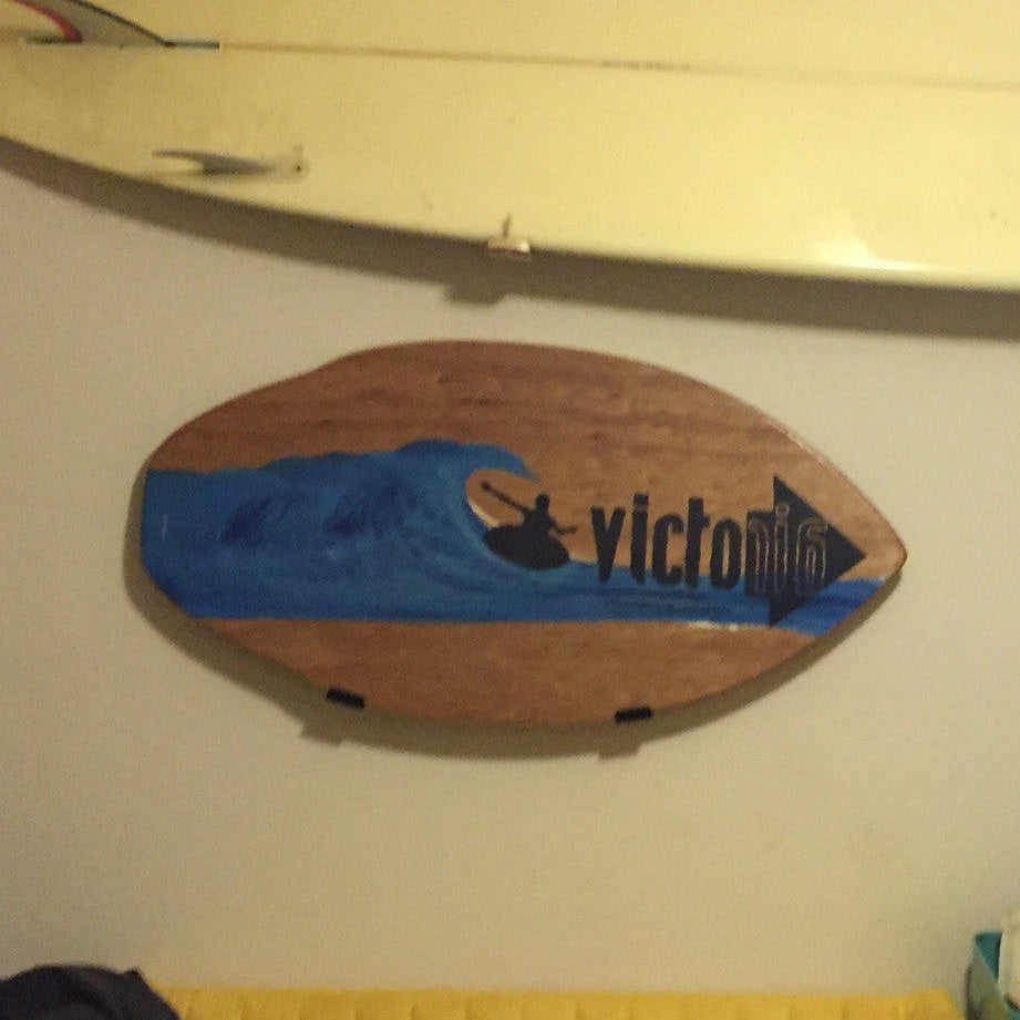 Minimalist Skimboard Display Rack for Stylish Storage